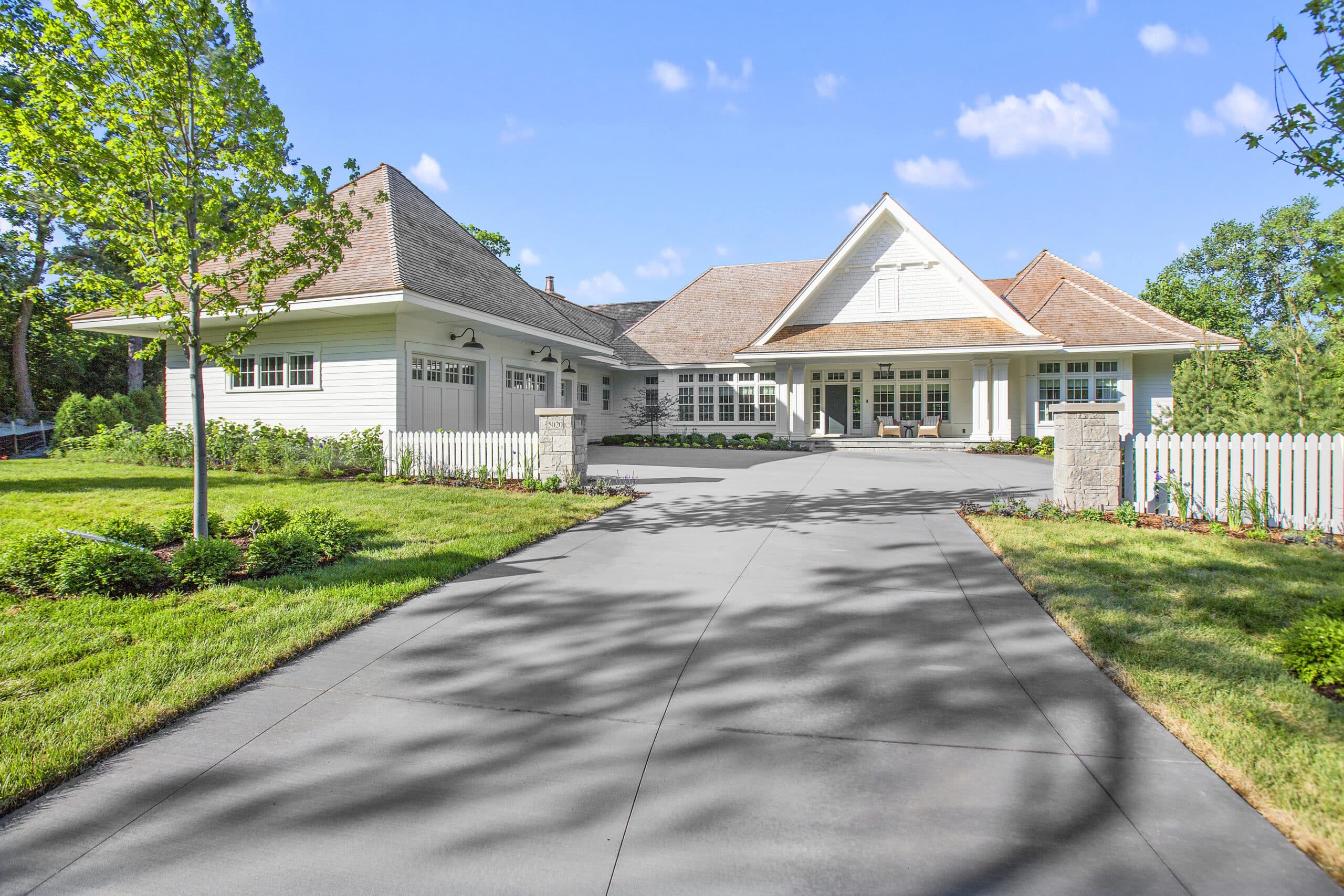 How does Asphalt Concrete Compare to Other Driveway Materials?